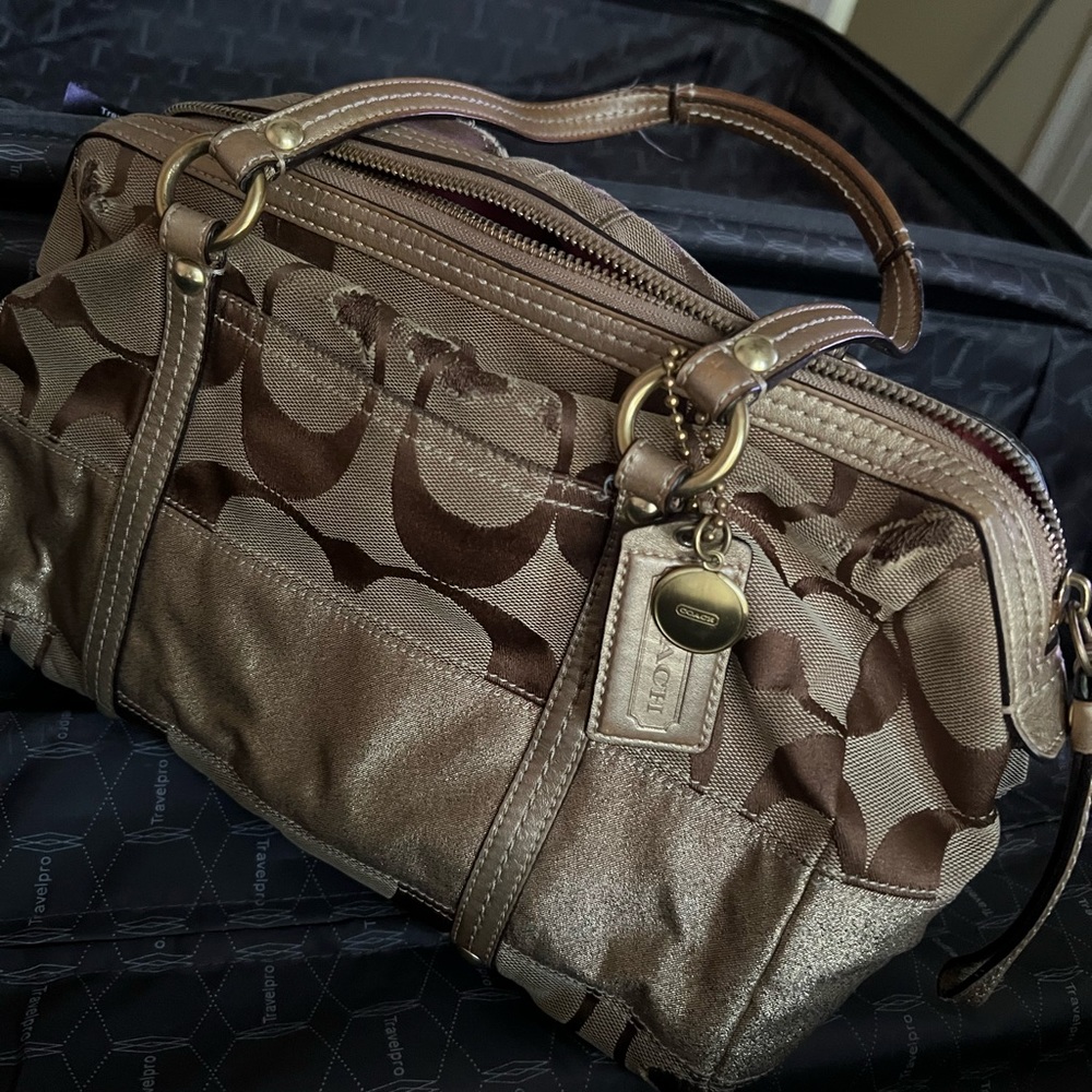 Vintage Used golden coach bag